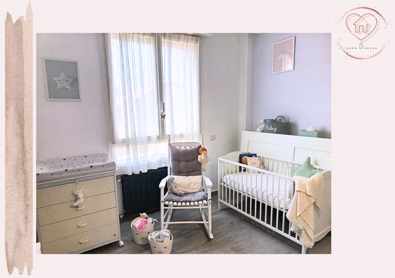 Soft pastel nursery room with white crib, yellow dresser, rocking chair, and sheer curtains by window